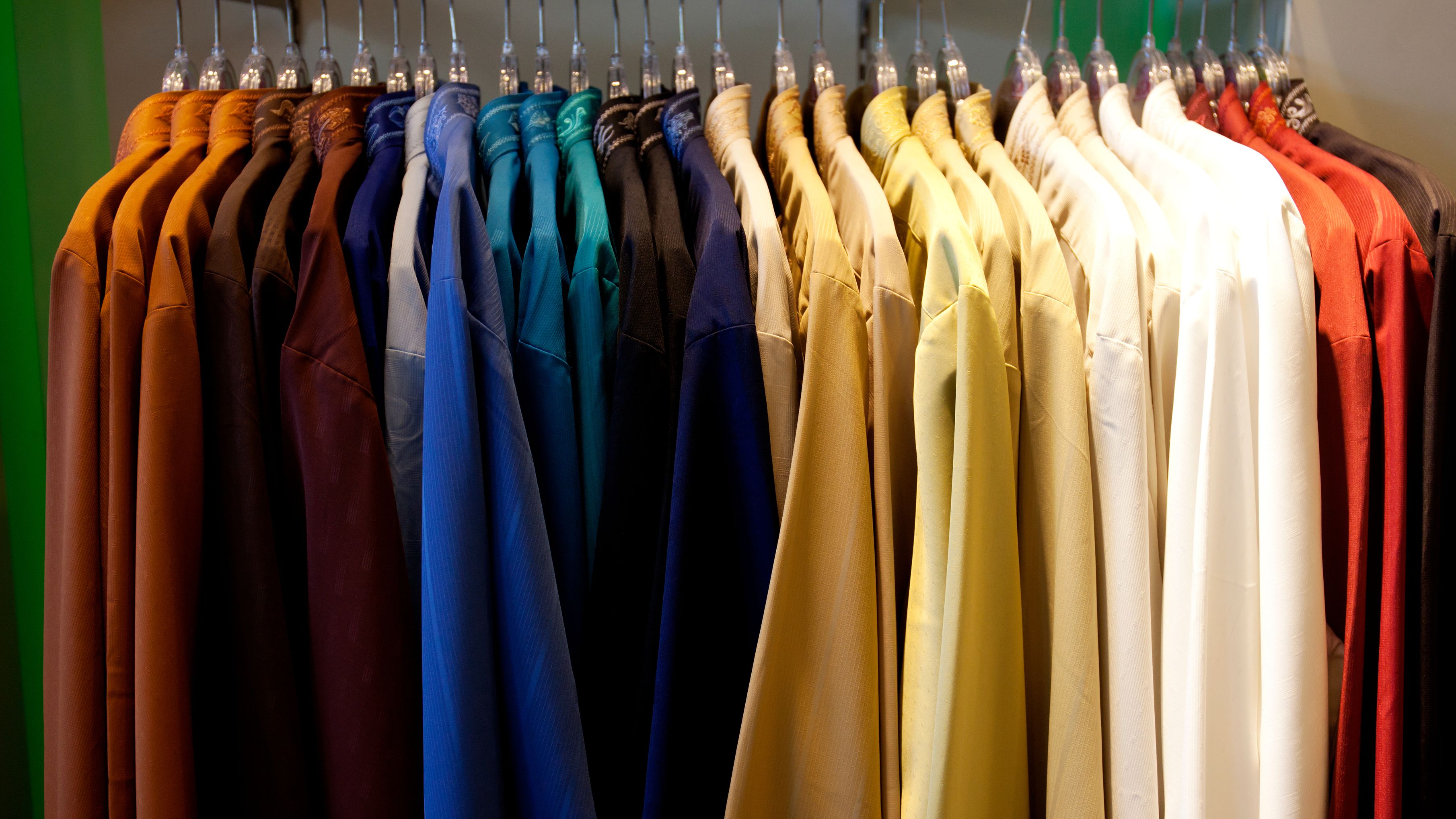 close-up-of-clothes-hanging-in-row-739240657-5a78b11f8e1b6e003715c0ec.jpg